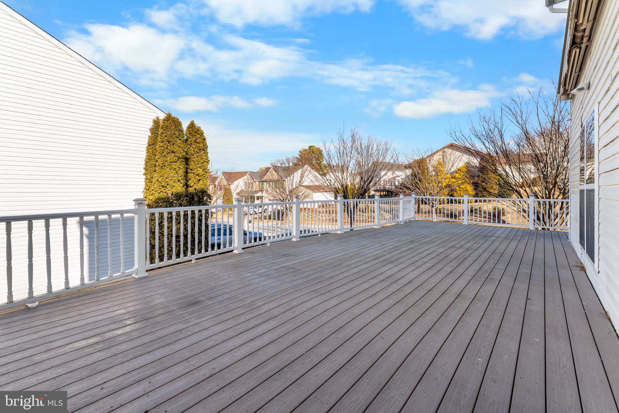 7510 Gilley Terrace Rosedale, MD 21237 - Photo 6 of 46 a view of a roof deck with wooden floor and fence