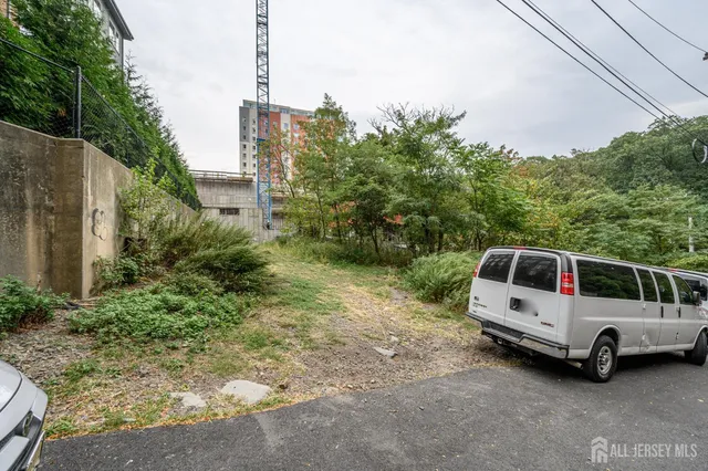 a view of a cars in front of a house