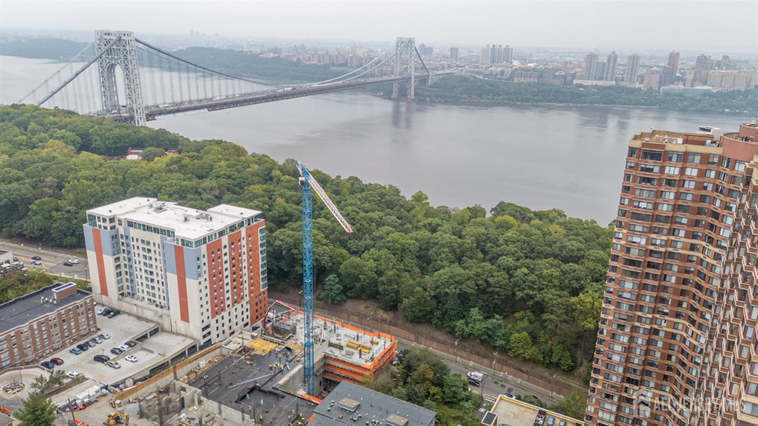 107 Old Palisade Road Fort Lee, NJ 07024 - Photo 4 of 11 a view of a lake with a mountain in the back