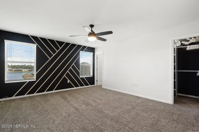 a bathroom with a sink a mirror and a shower