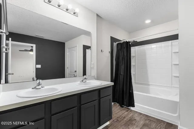 a view of an empty room with a fireplace