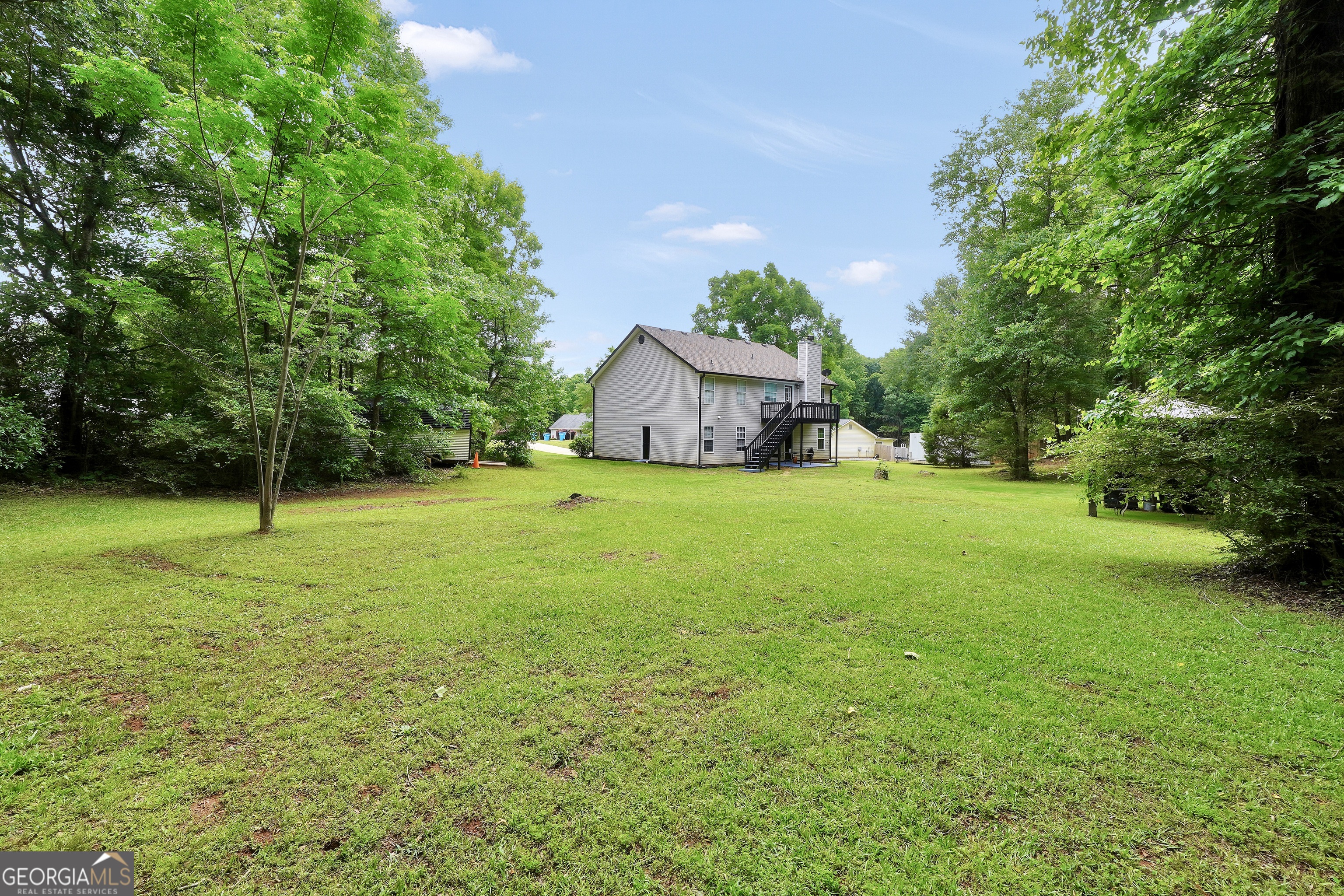 110 Westeria Way Jackson, GA 30233 - Photo 40 of 45 a view of a house with a yard