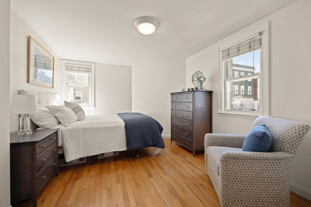 280 E Street, Unit 1 Boston, MA 02127 - Photo 9 of 19 a living room with furniture and wooden floor