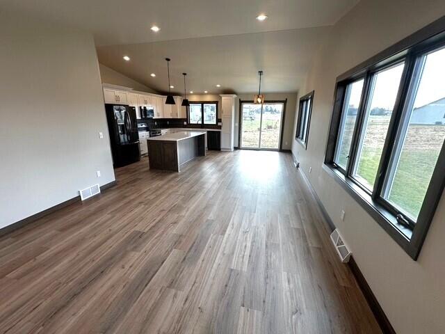100 Orth Drive, Unit 1 Random Lake, WI 53075 - Photo 6 of 30 Living Room to Kitchen