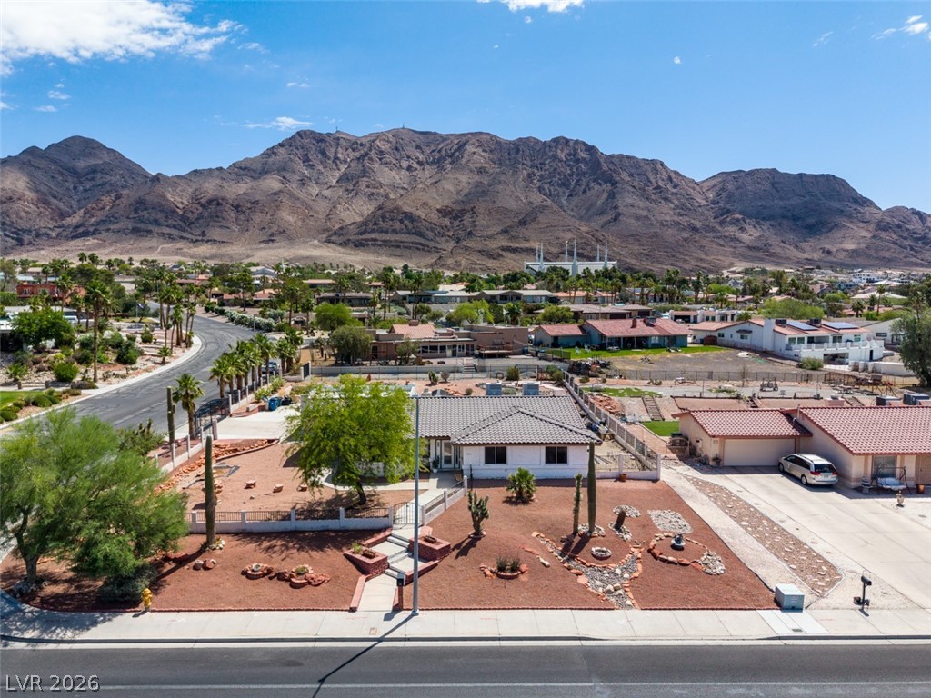 892 North Hollywood Boulevard Las Vegas, NV 89110 - Photo 72 of 81 Perched below a majestic mountain, this property offers serene desert landscaping and a spacious driveway.