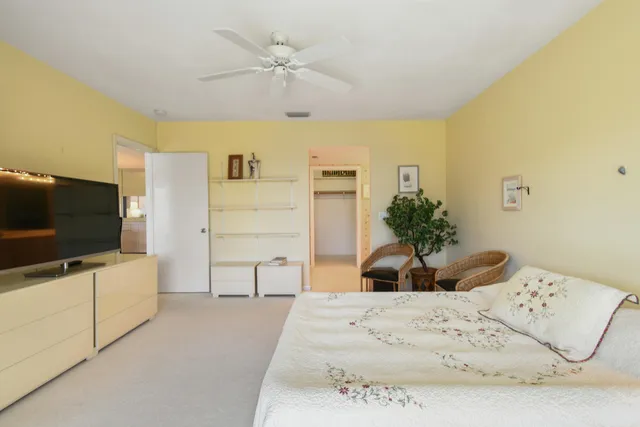 a living room with a couch and a flat screen tv