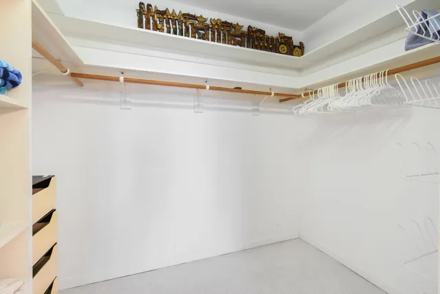 a view of a room with racks on the wall