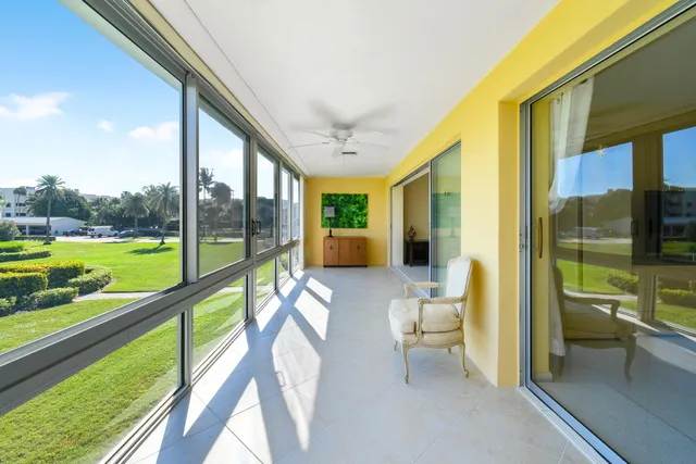 a view of a chairs and table in the patio