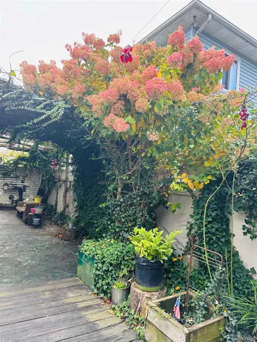 a view of a yard with an outdoor space