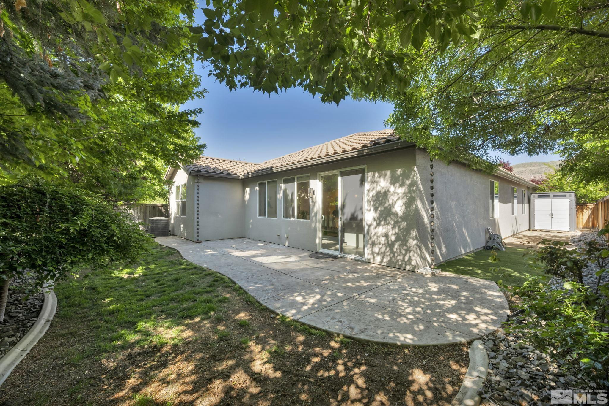 11355 Crotone Way Reno, NV 89521 - Photo 36 of 39 a view of a house with a yard