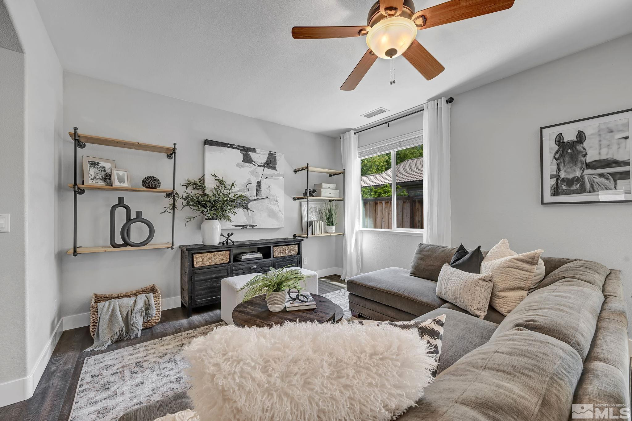 11355 Crotone Way Reno, NV 89521 - Photo 6 of 39 a living room with furniture and a window