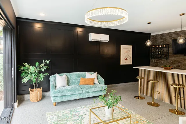 a kitchen with white cabinets a sink and dishwasher