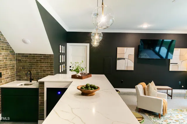 a view of a livingroom with furniture and window