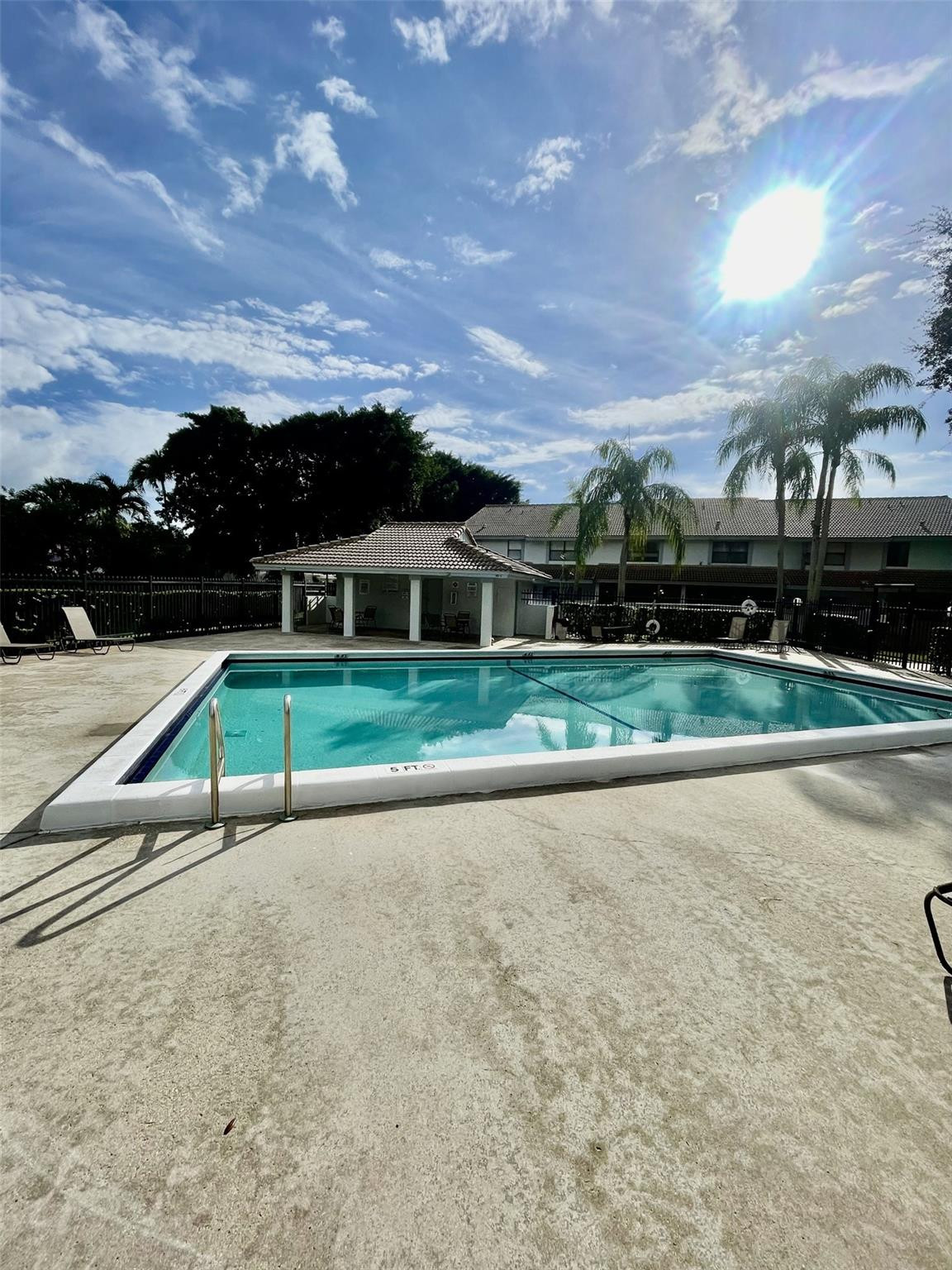 9787 Riverside Drive, Unit 624 Coral Springs, FL 33071 - Photo 20 of 21 front view of a house with a yard