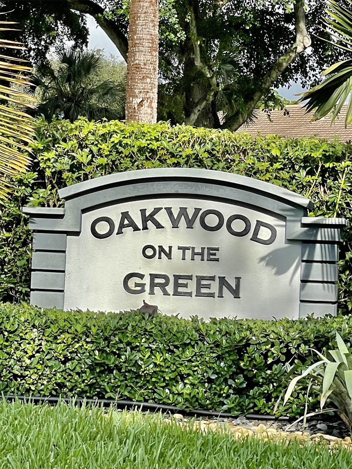 9787 Riverside Drive, Unit 624 Coral Springs, FL 33071 - Photo 3 of 21 a sign on the side of a building