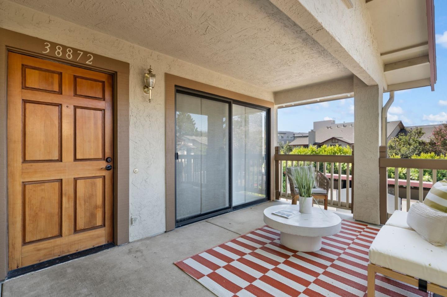 38872 Cherry Glen Common Fremont, CA 94536 - Photo 6 of 22 a living room with furniture and a table