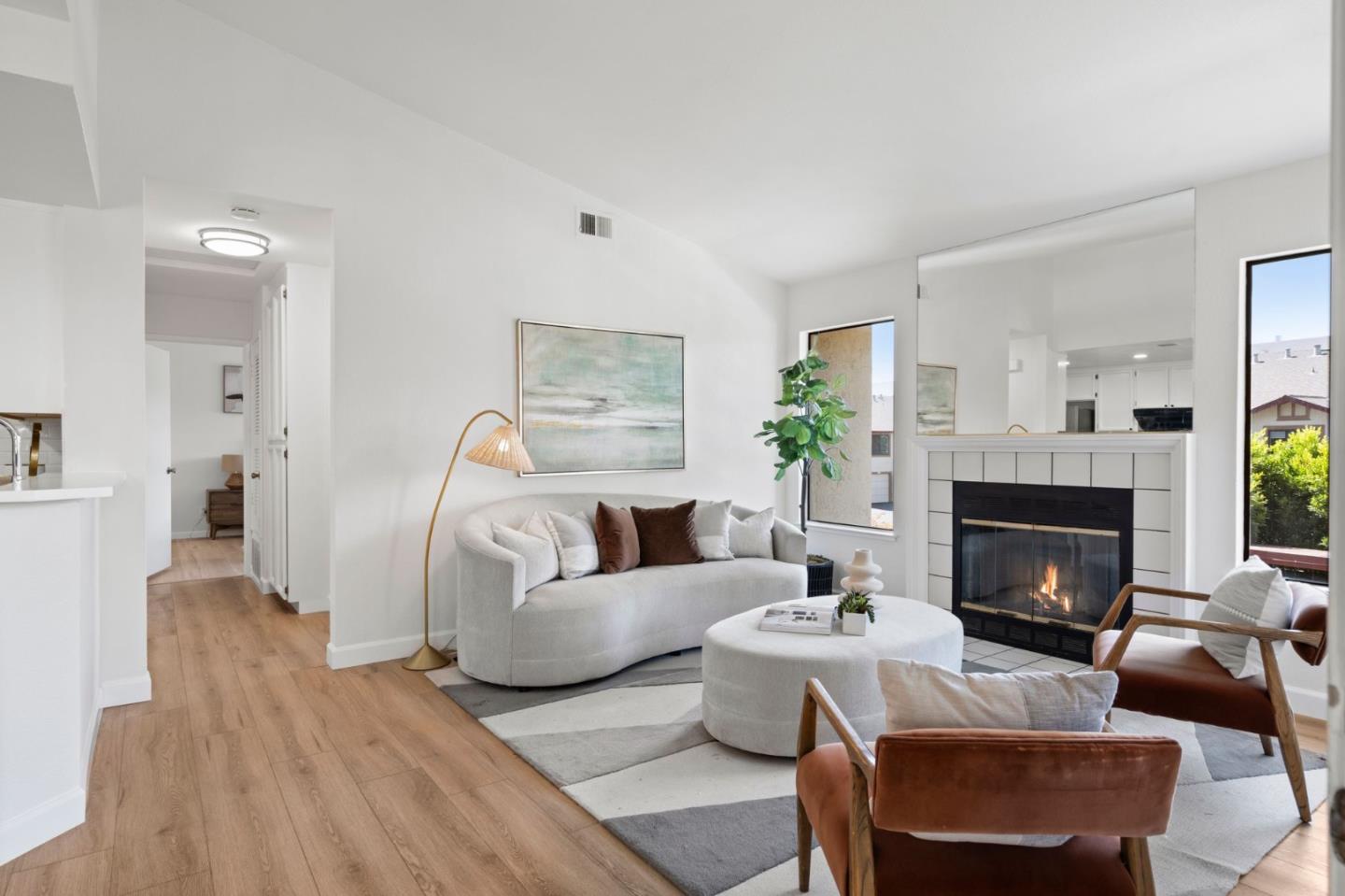 38872 Cherry Glen Common Fremont, CA 94536 - Photo 7 of 22 a living room with furniture and a fireplace