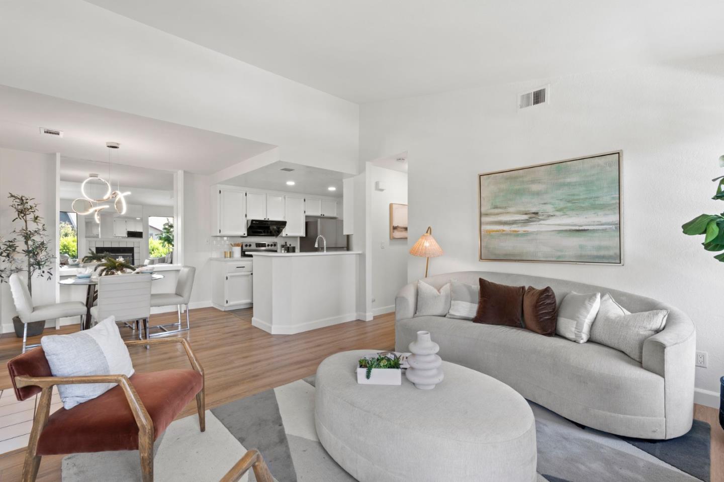 38872 Cherry Glen Common Fremont, CA 94536 - Photo 8 of 22 a living room with furniture kitchen and a table