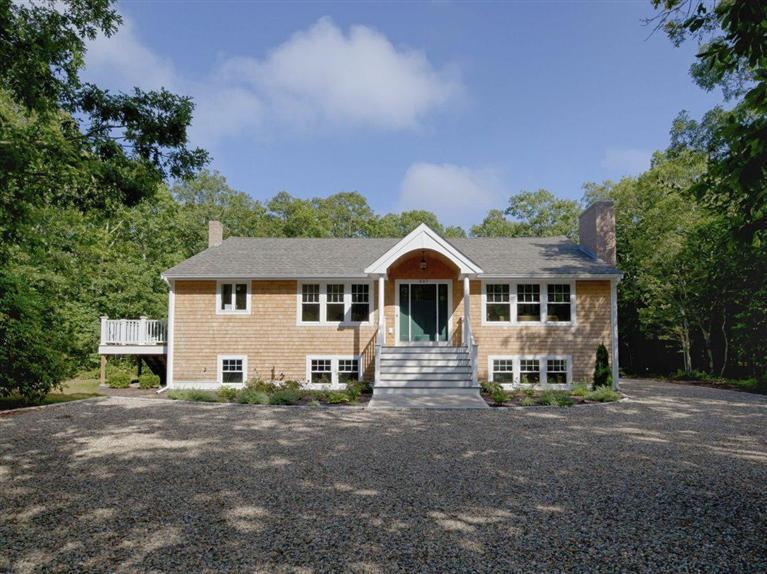 537 Scraggy Neck Road Cataumet, MA 02534 - Photo 1 of 33 a front view of a house with a yard