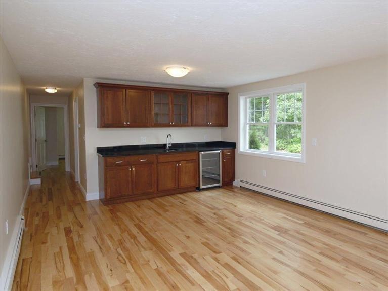 537 Scraggy Neck Road Cataumet, MA 02534 - Photo 19 of 33 a view of kitchen with wooden floor and electronic appliances