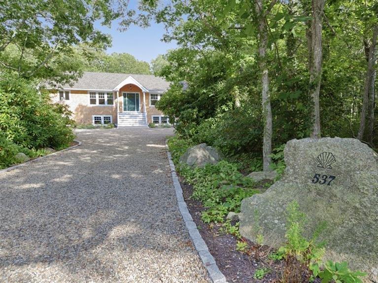 537 Scraggy Neck Road Cataumet, MA 02534 - Photo 2 of 33 a aerial view of a house with a yard