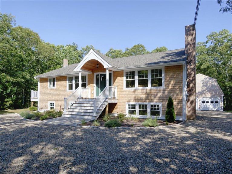 537 Scraggy Neck Road Cataumet, MA 02534 - Photo 3 of 33 a front view of a house with a yard