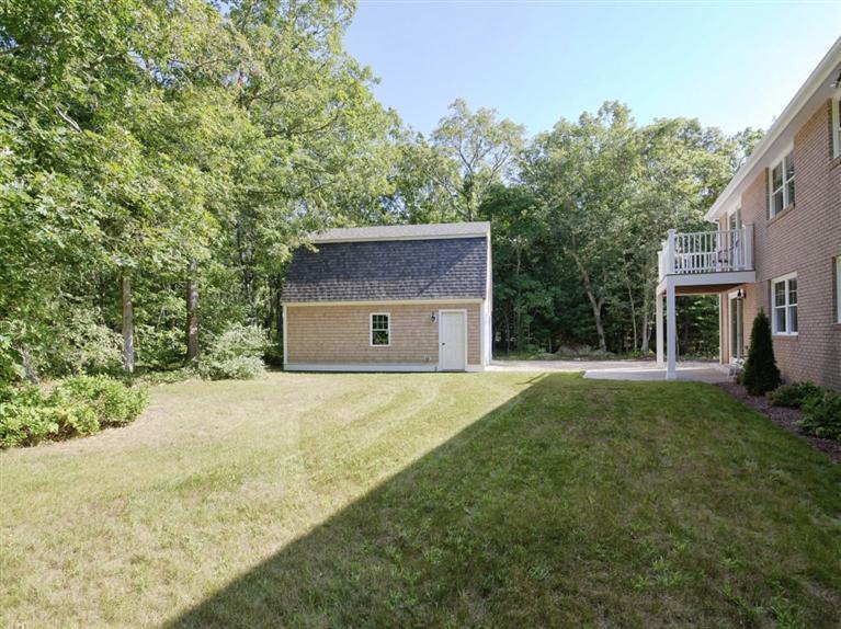 537 Scraggy Neck Road Cataumet, MA 02534 - Photo 31 of 33 a house with trees in front of it