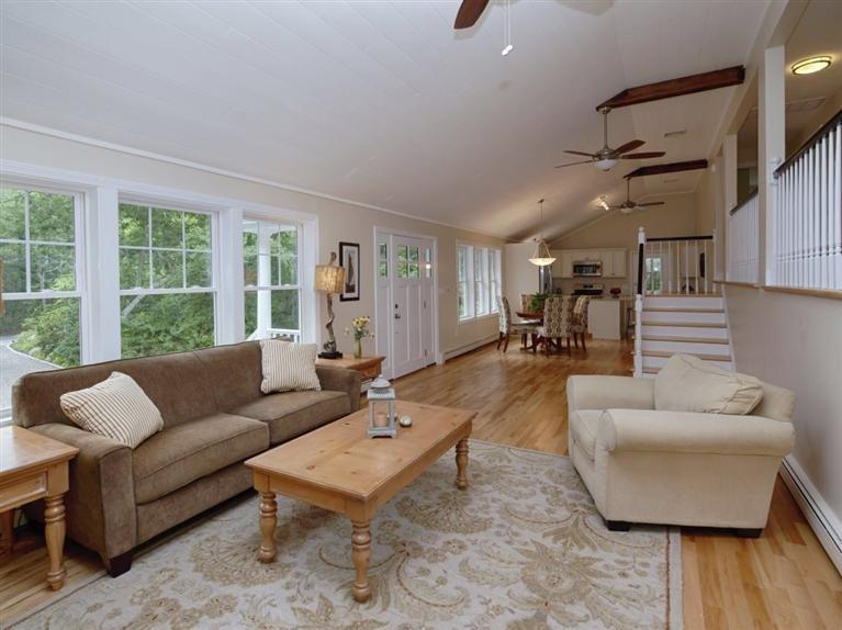 537 Scraggy Neck Road Cataumet, MA 02534 - Photo 9 of 33 a living room with furniture and wooden floor