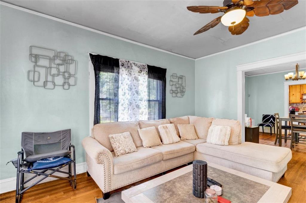 943 Washington Place Southwest Atlanta, GA 30314 - Photo 2 of 25 a living room with furniture and a large window