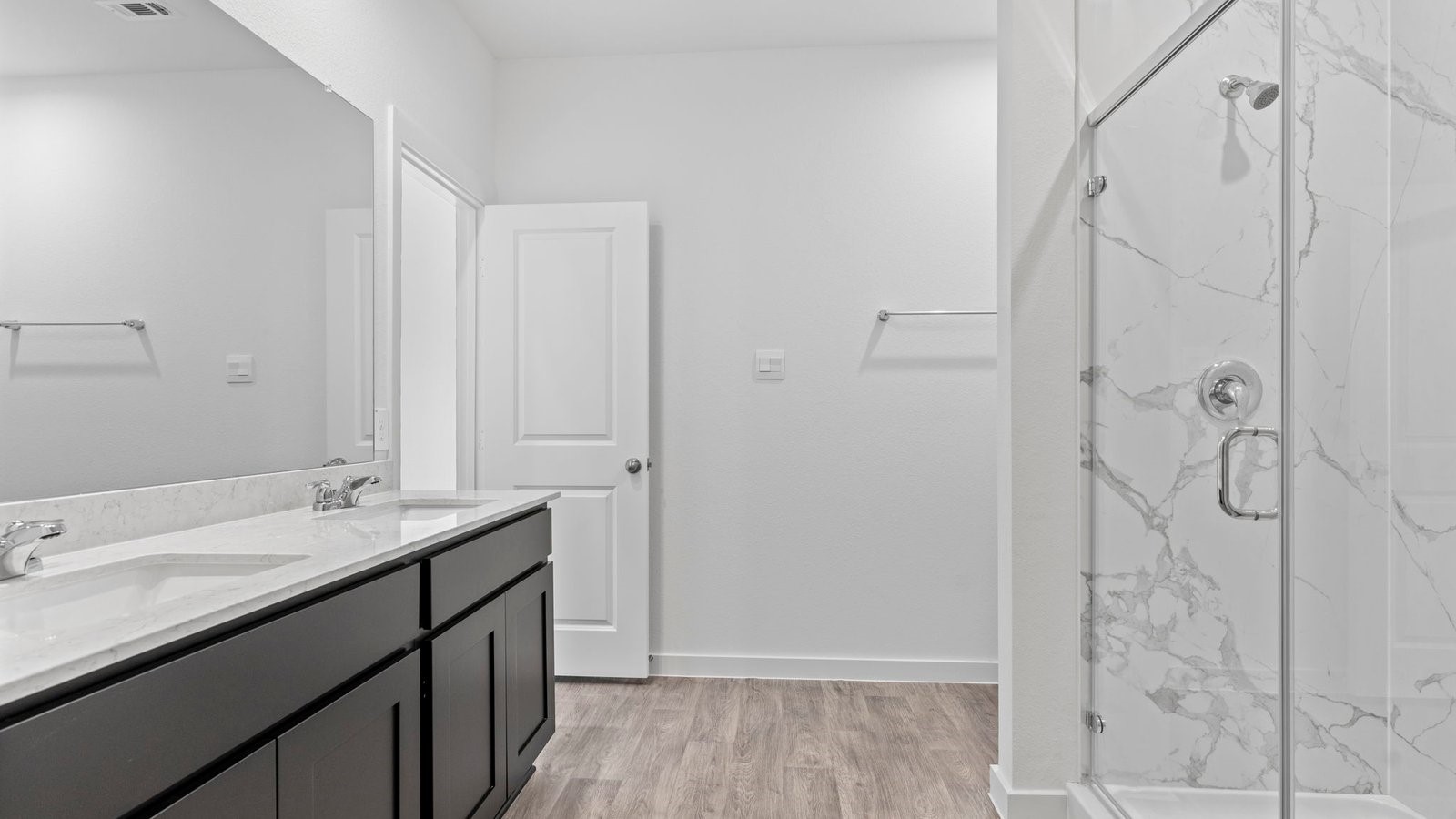 6216 Orchid Crst Lane Rosenberg, TX 77469 - Photo 22 of 48 a bathroom with a granite countertop sink a shower and a mirror