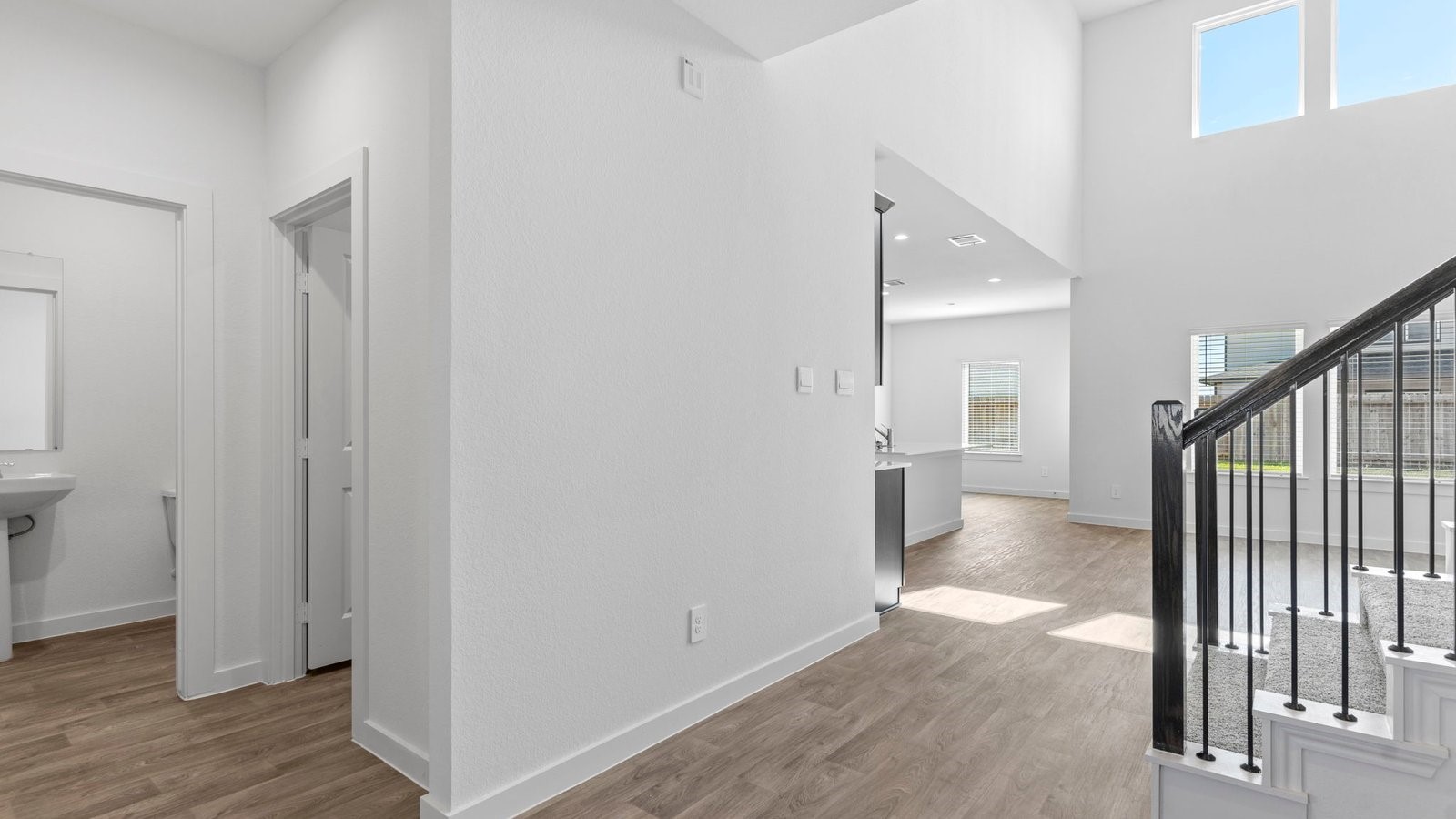 6216 Orchid Crst Lane Rosenberg, TX 77469 - Photo 4 of 48 a view of a hallway with wooden floor and entryway