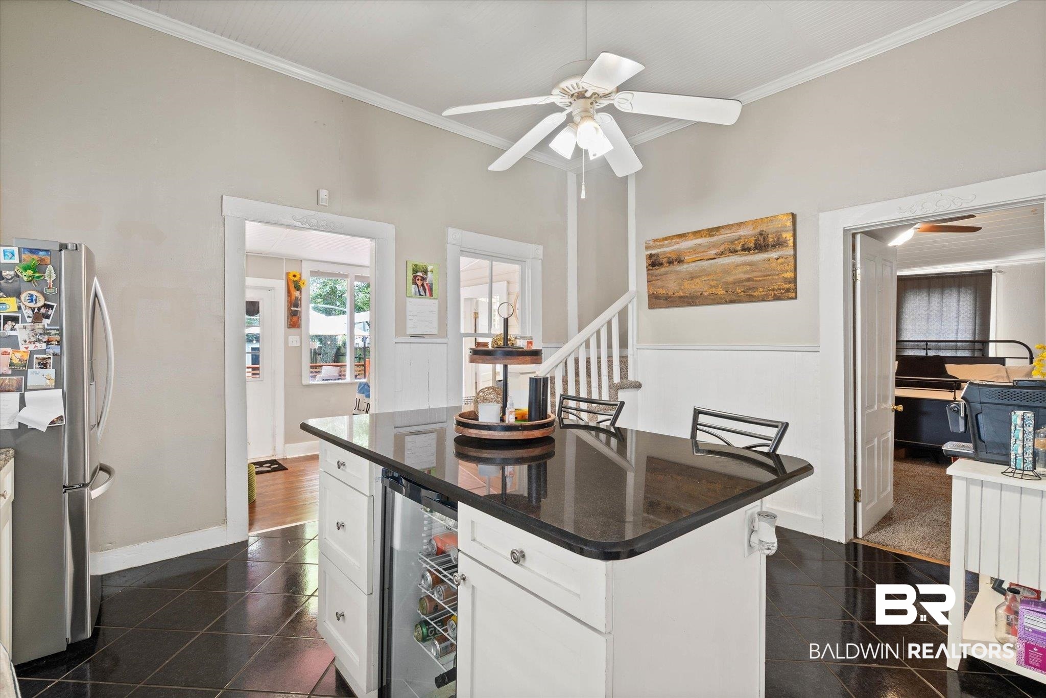 20 Hurlbert Street Mobile, AL 36607 - Photo 7 of 33 Kitchen with freestanding refrigerator, granite floors, ceiling fan, wine cooler, and ornamental molding