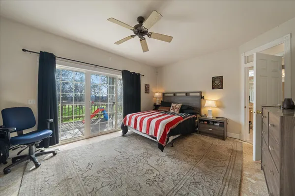 a bedroom with a bed and furniture