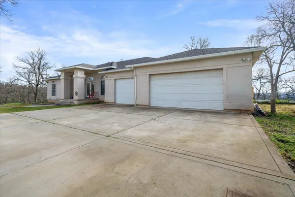 front view of a house with a garage