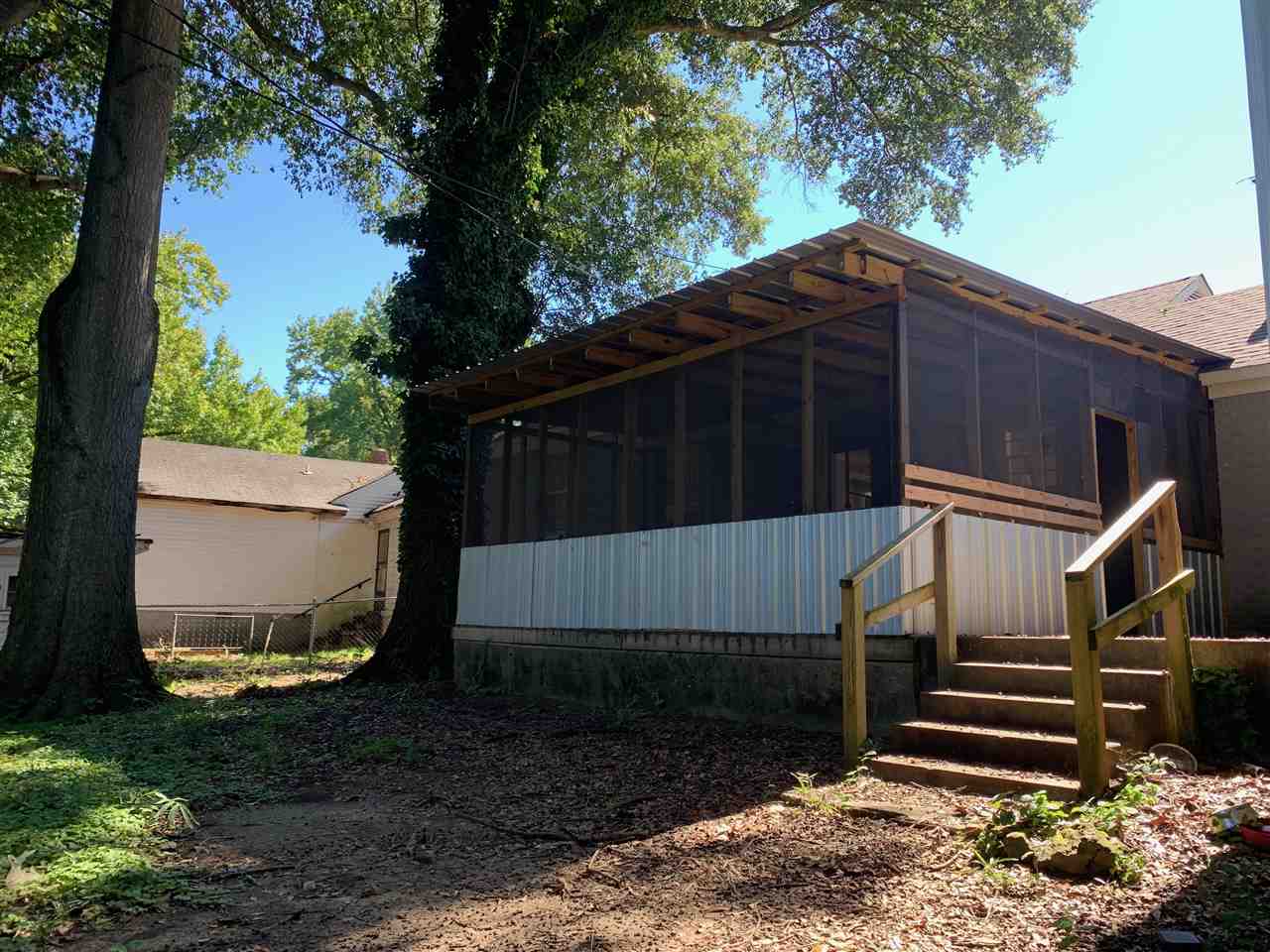 985 Little John Road Memphis, TN 38111 - Photo 22 of 24 a house view with a backyard