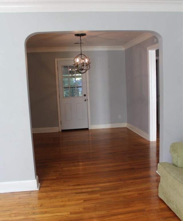 985 Little John Road Memphis, TN 38111 - Photo 4 of 24 a view of a livingroom with wooden floor