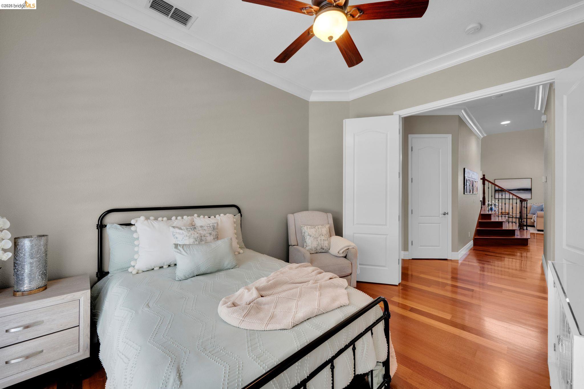 2513 Winged Foot Road Brentwood, CA 94513 - Photo 28 of 45 Room featuring wood-finish flooring, vaulted ceilings, and a ceiling fan with integrated lighting