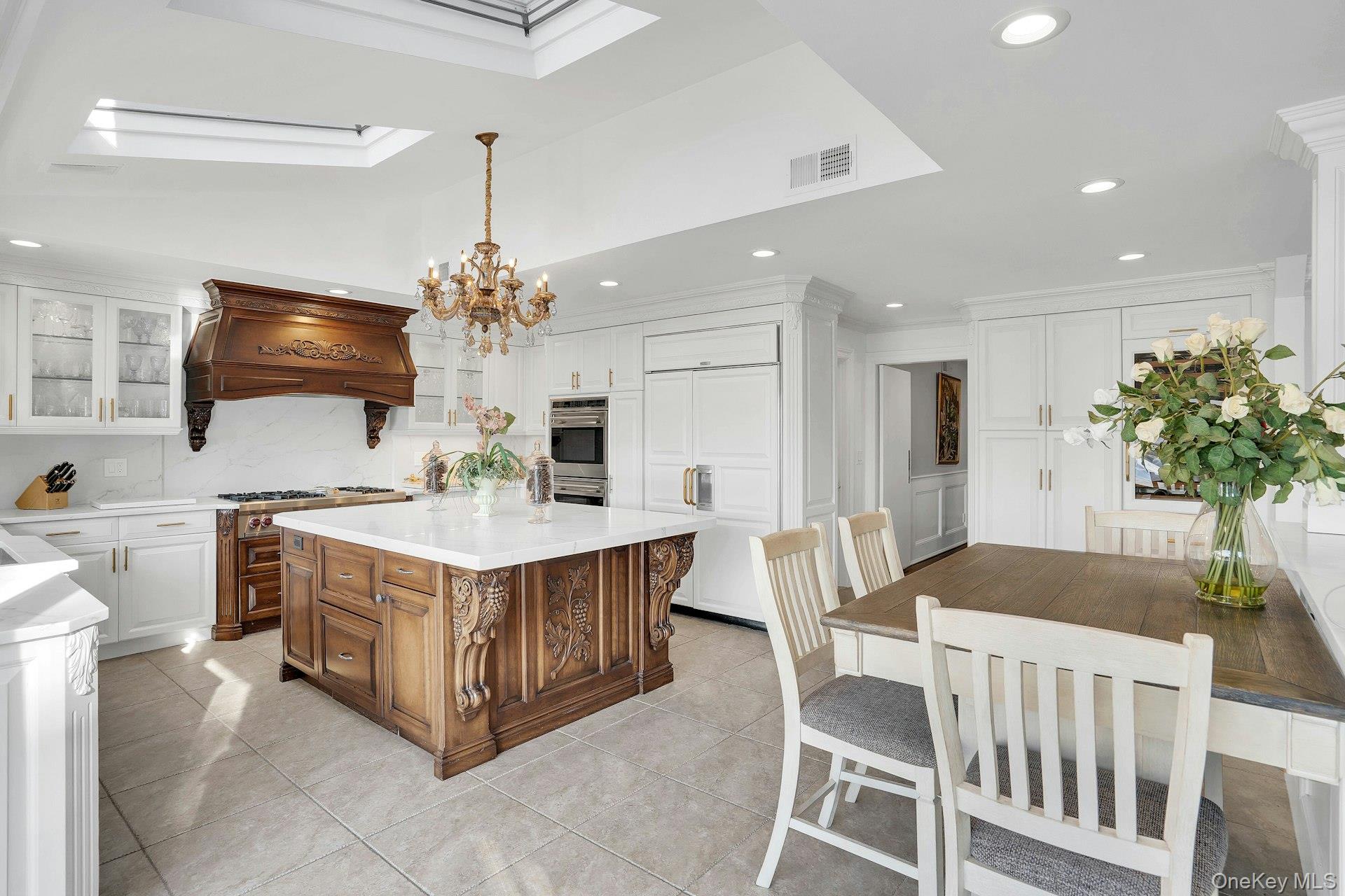 10 Beech Road Islip, NY 11751 - Photo 15 of 49 Newly Renovated with radiant floors and crystal chandelier.
