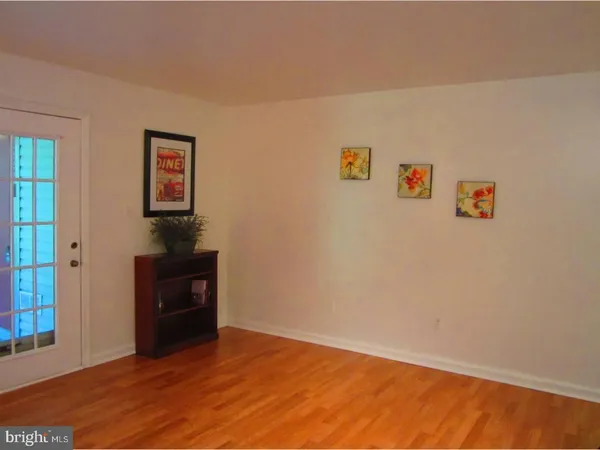 a room with furniture and a rug