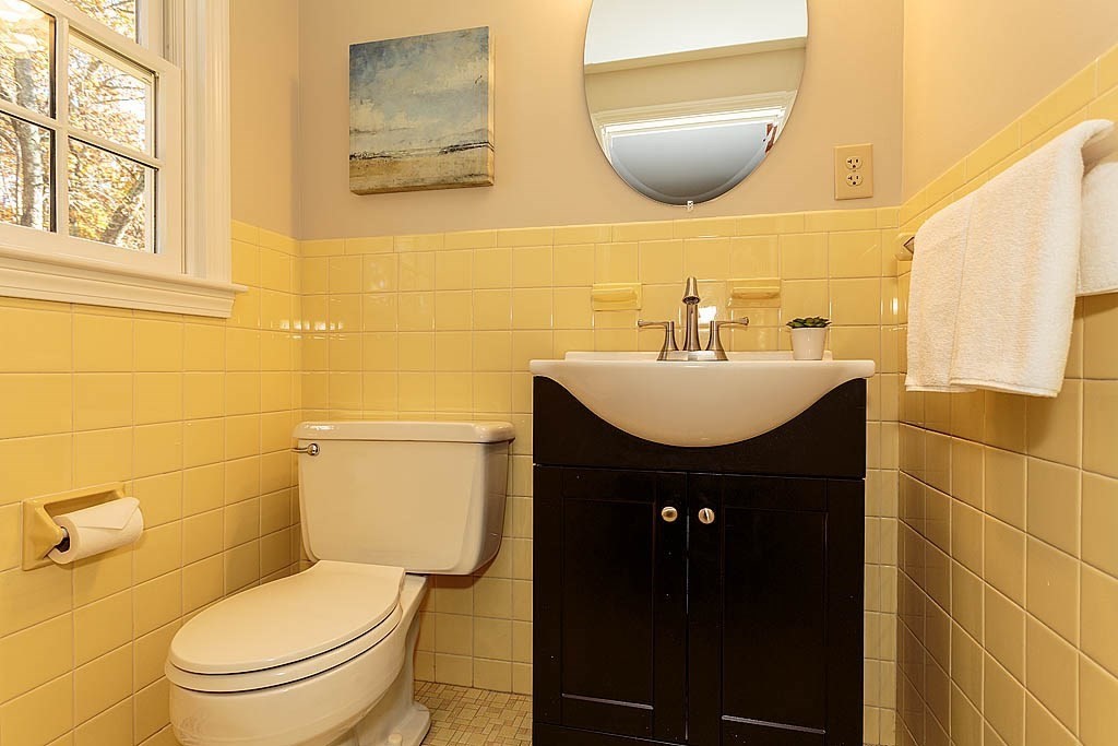 49 Amble Road Chelmsford, MA 01824 - Photo 15 of 26 a bathroom with a sink toilet and mirror