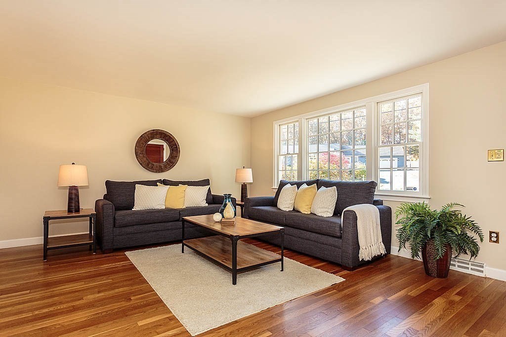 49 Amble Road Chelmsford, MA 01824 - Photo 4 of 26 a living room with furniture and a large window