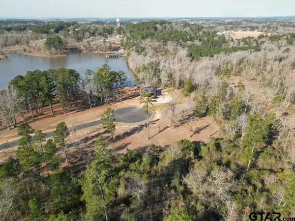 an aerial view of residential building and lake view