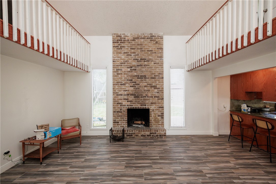 4029 Congressional Drive Corpus Christi, TX 78413 - Photo 12 of 34 a living room with furniture and a fireplace