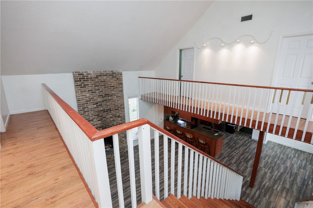 4029 Congressional Drive Corpus Christi, TX 78413 - Photo 15 of 34 a view of staircase with railing and a rug