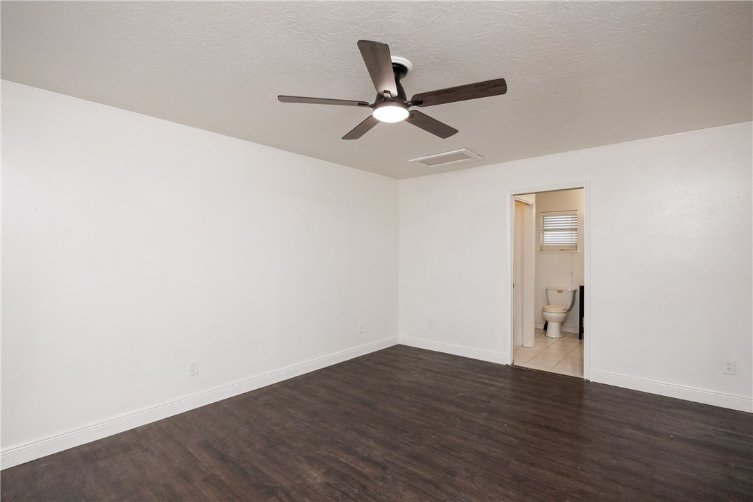4029 Congressional Drive Corpus Christi, TX 78413 - Photo 29 of 34 a view of an empty room with wooden floor