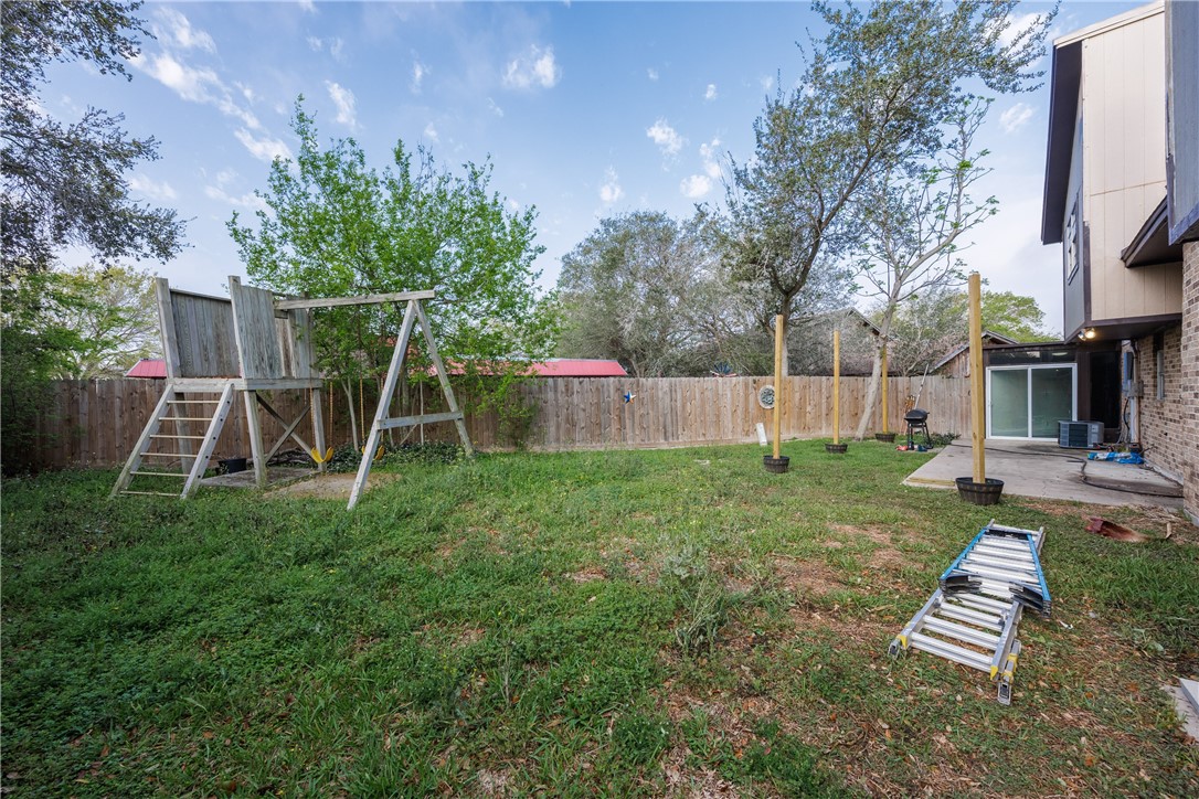 4029 Congressional Drive Corpus Christi, TX 78413 - Photo 34 of 34 a view of a backyard with table and chairs