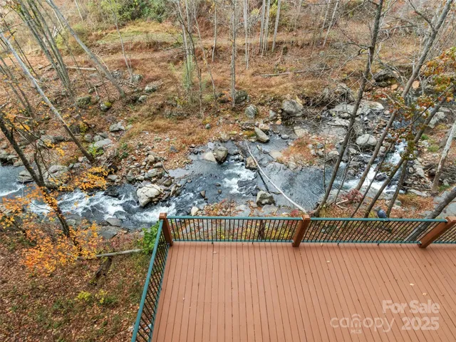 a view of wooden balcony with city view