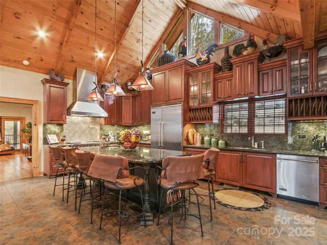 a view of a chairs and table in the patio