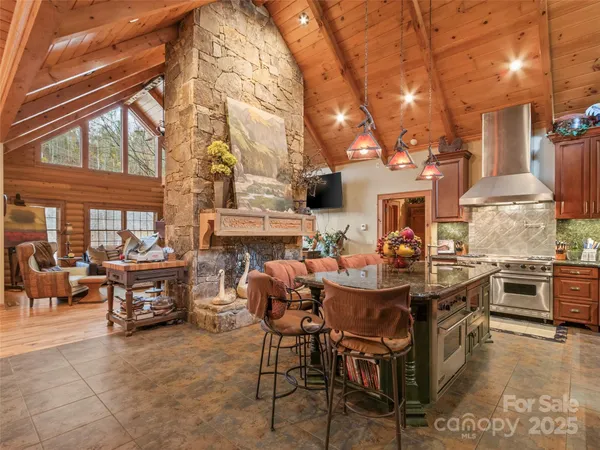 a view of a patio with table and chairs