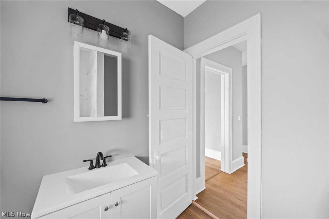 2140 Broadview Road Cleveland, OH 44109 - Photo 35 of 42 Upper front unit bathroom with vanity and hardwood / wood-style flooring